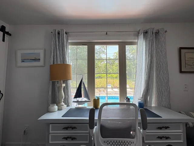 a room with furniture and a window