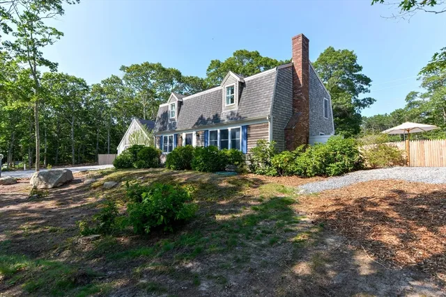 a house view with a garden space