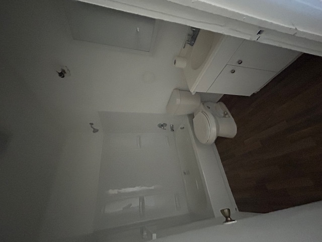 211 West Washington Street, Unit 4 Seguin, TX 78155 - Photo 7 of 7 Full bathroom with vanity, washtub / shower combination.