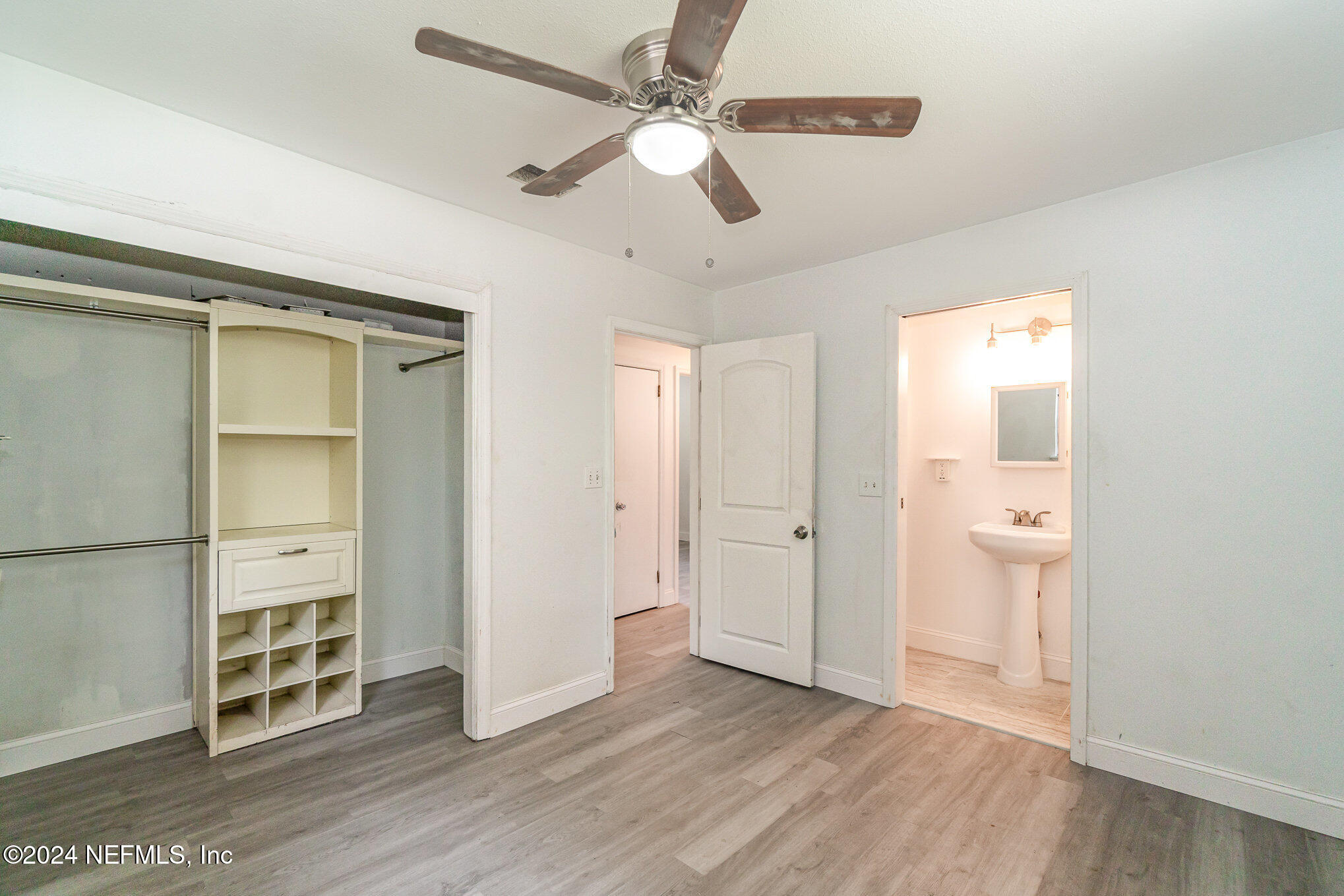 1108 Blair Road Jacksonville, FL 32221 - Photo 20 of 30 wooden floor in an empty room with a window