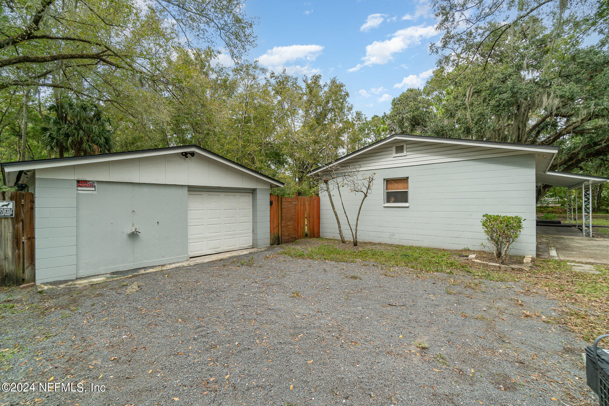 1108 Blair Road Jacksonville, FL 32221 - Photo 25 of 30 a house with trees in the background