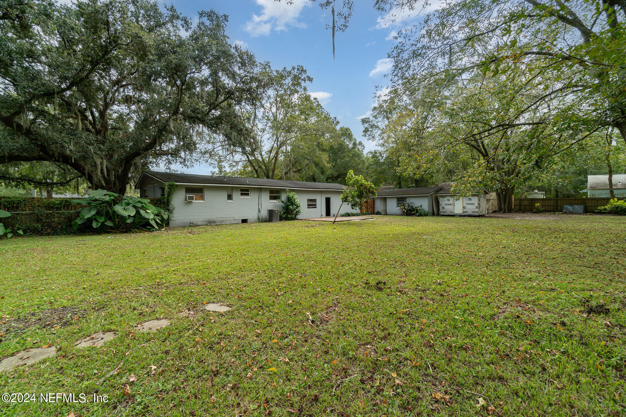 1108 Blair Road Jacksonville, FL 32221 - Photo 29 of 30 a view of a house with yard and tree s