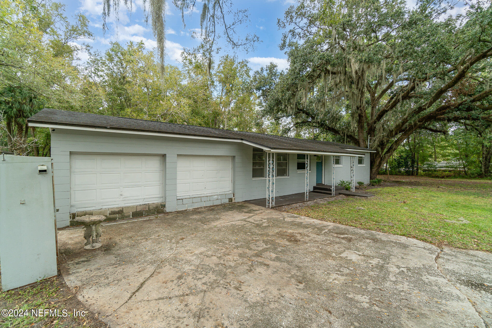 1108 Blair Road Jacksonville, FL 32221 - Photo 4 of 30 a front view of house with yard and trees