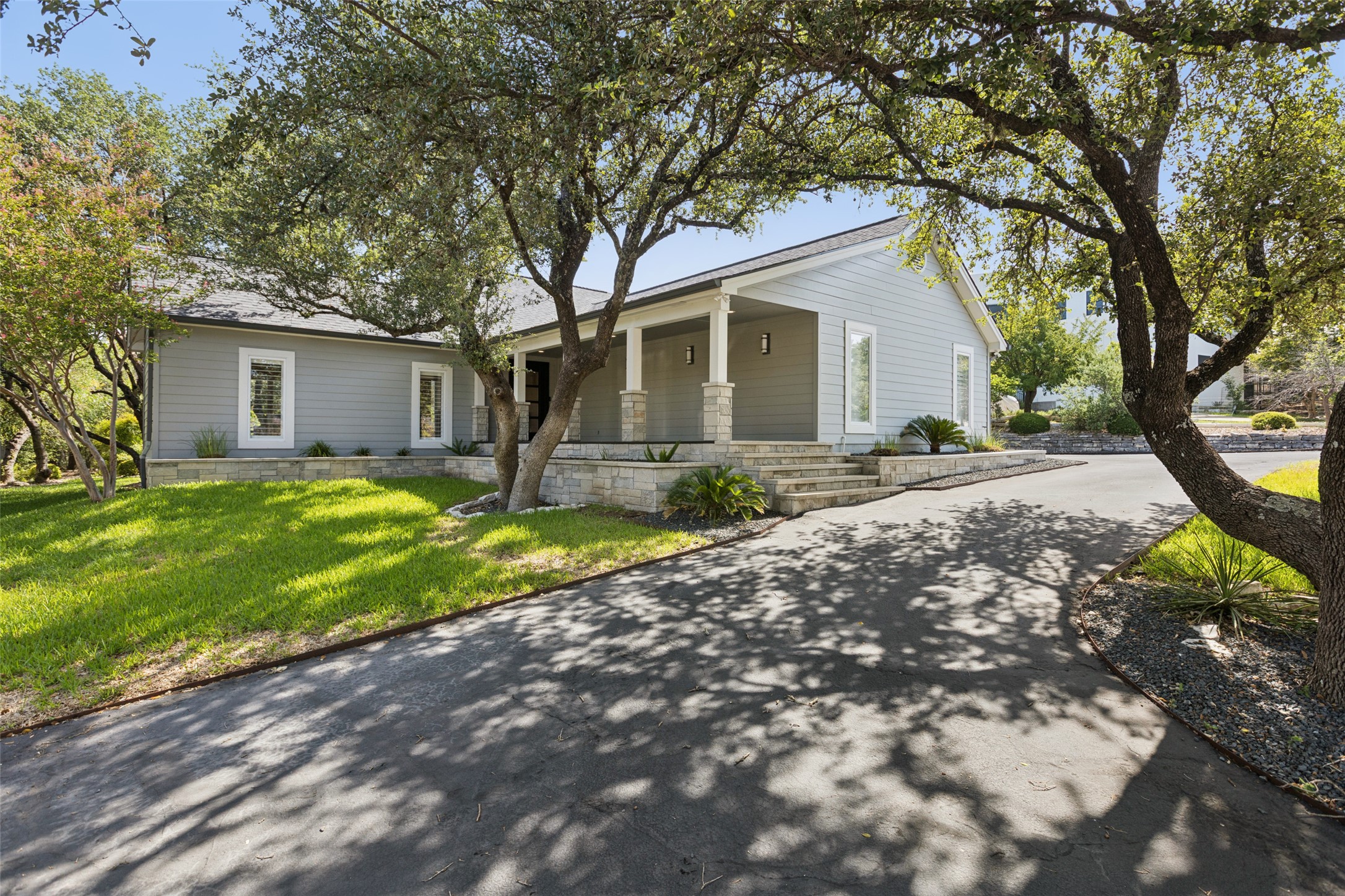 409 Malabar Street Austin, TX 78734 - Photo 1 of 1 a front view of house with yard and green space