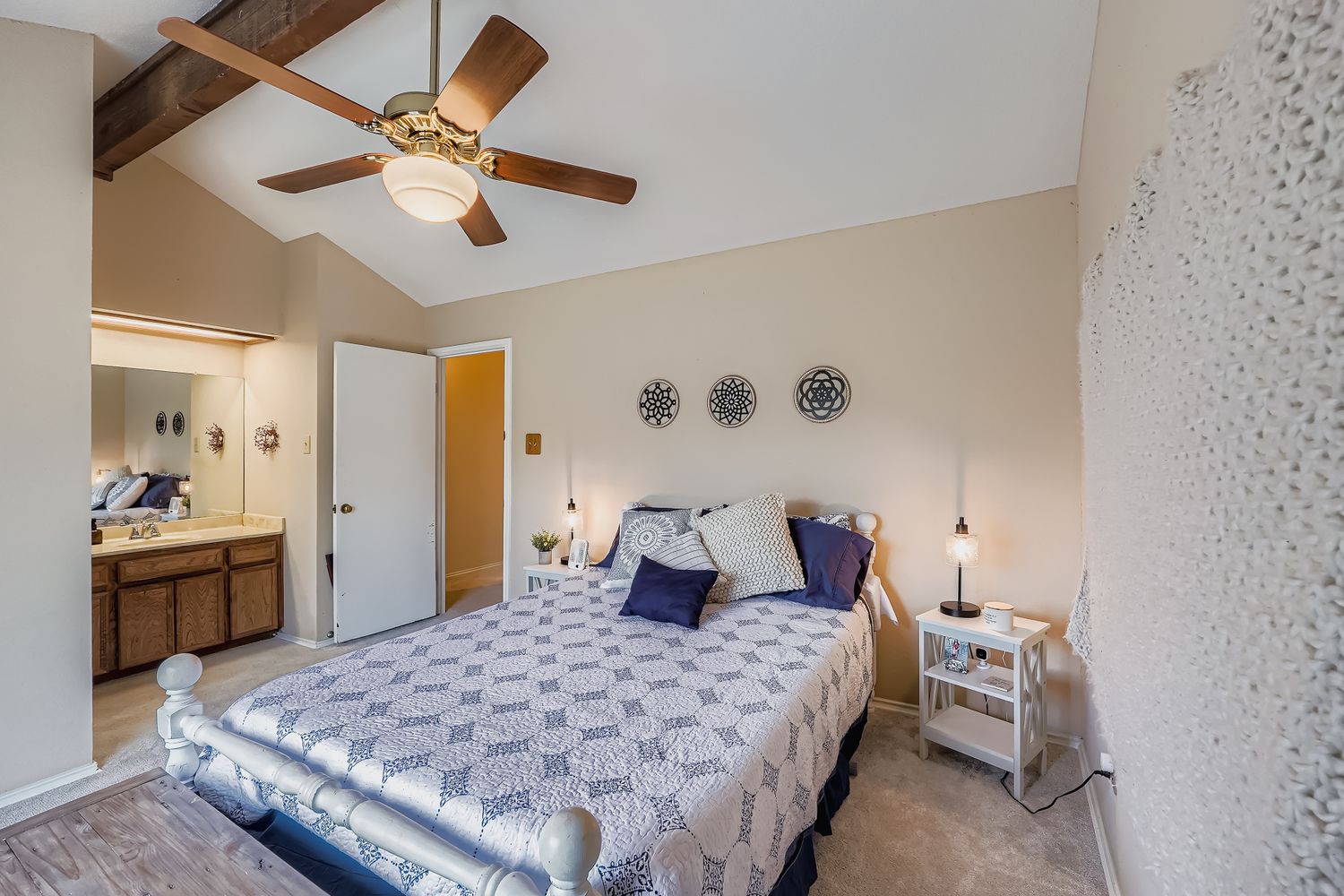 500 Hesters Crossing Road, Unit 310 Round Rock, TX 78681 - Photo 20 of 28 a bedroom with a bed and a chandelier