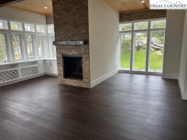 330 North Pinnacle Ridge Road Beech Mountain, NC 28604 - Photo 20 of 38 a view of an empty room with glass door and wooden floor