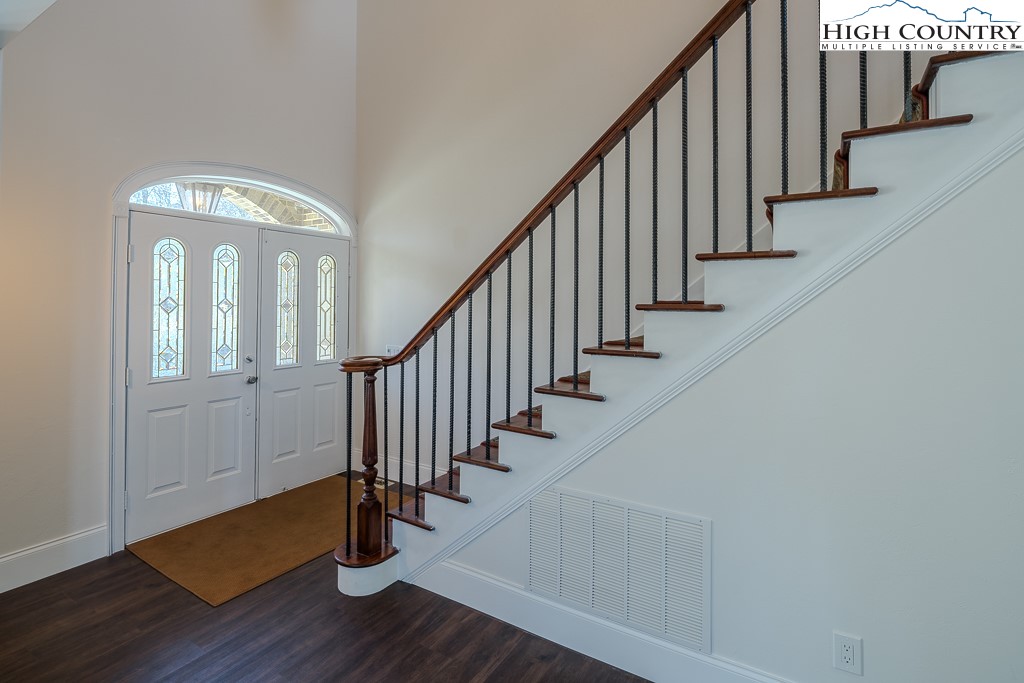 330 North Pinnacle Ridge Road Beech Mountain, NC 28604 - Photo 10 of 38 a view of an entryway with wooden floor and staircase