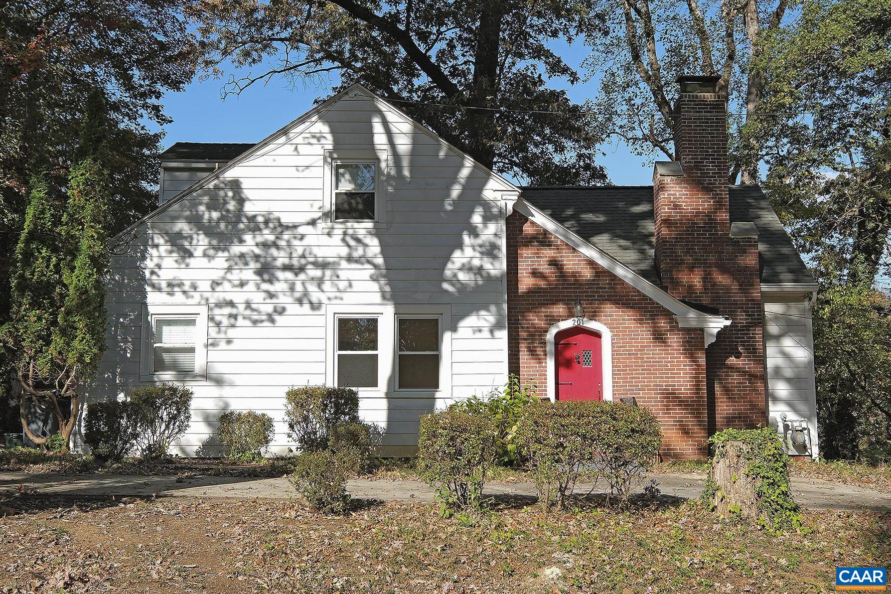 201 Cleveland Avenue Charlottesville, VA 22903 - Photo 12 of 15 a front view of a house with a yard