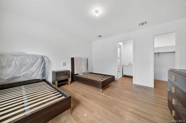 a room with furniture and wooden floor