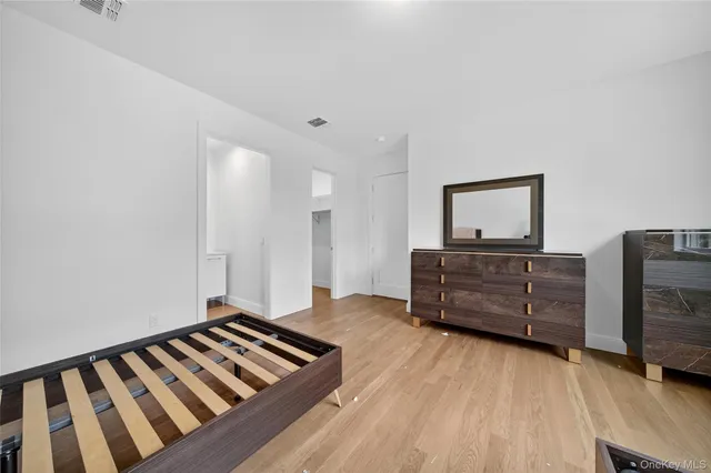 a view of a bathroom with sink and mirror