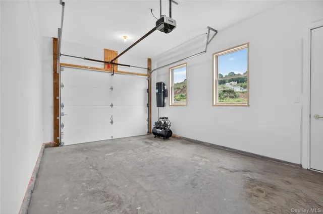 a balcony with wooden floor and fence