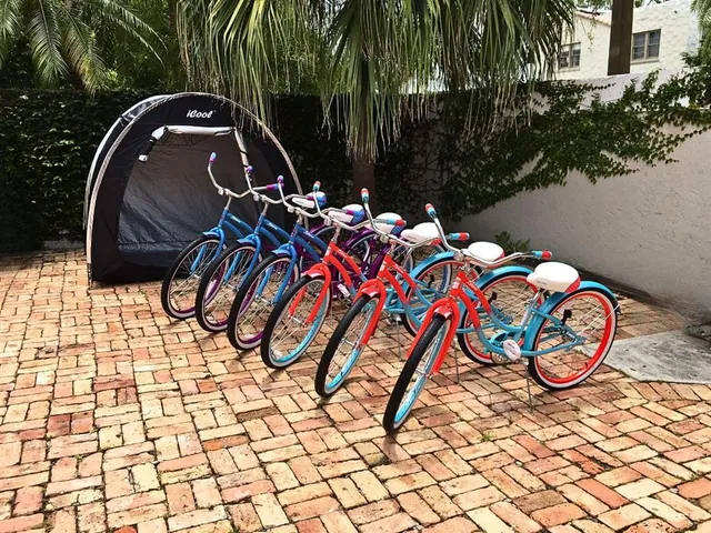 a view of a balcony with two chairs and a table