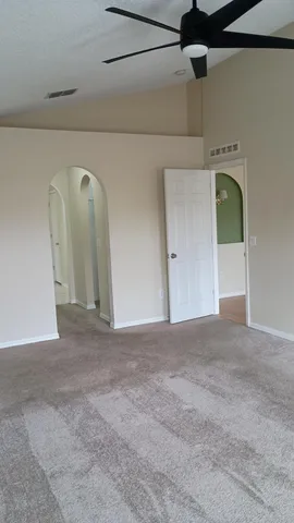 a view of a livingroom with a staircase