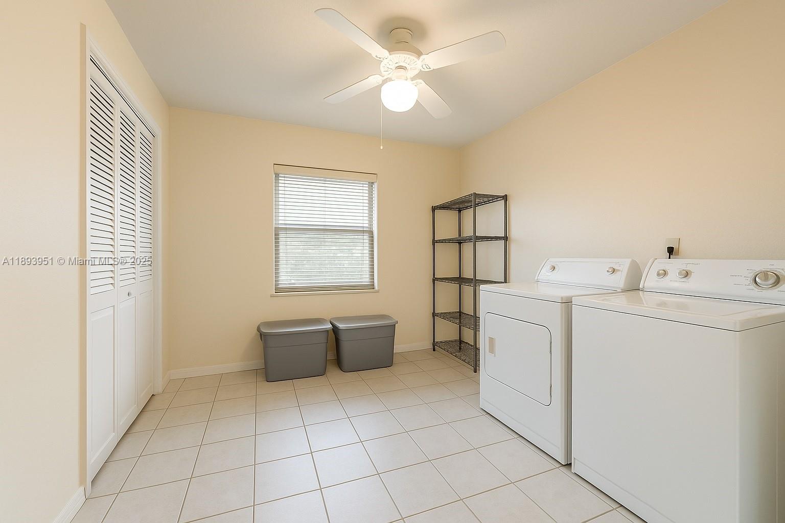 6240 Southwest 20th Terrace Miami, FL 33155 - Photo 26 of 30 a utility room with dryer and washer