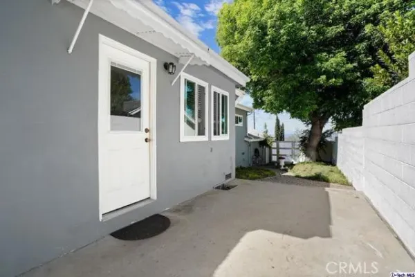 a backyard of a house with lots of green space