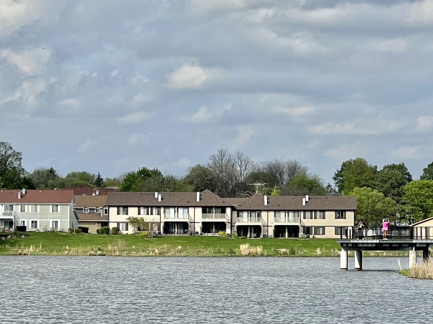 370 Springlake Lane, Unit B Aurora, IL 60504 - Photo 15 of 26 a front view of a house with a yard