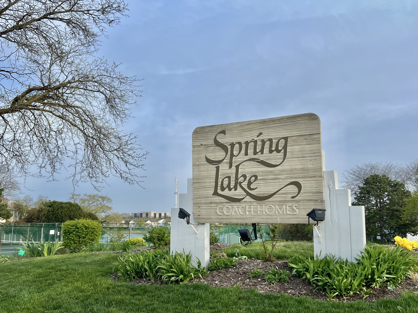 370 Springlake Lane, Unit B Aurora, IL 60504 - Photo 17 of 26 a sign on the side of a building