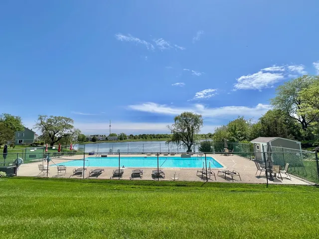 a view of a garden with houses