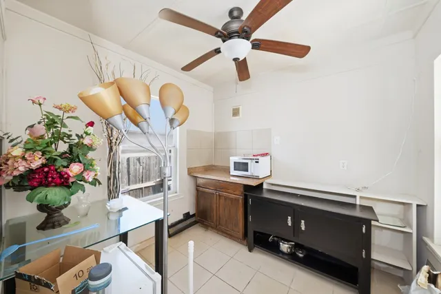 a room with cabinets and wooden floor