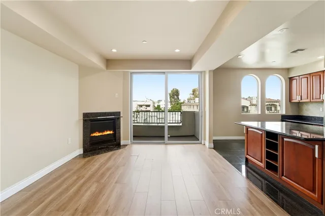 a kitchen with stainless steel appliances a stove top oven and sink