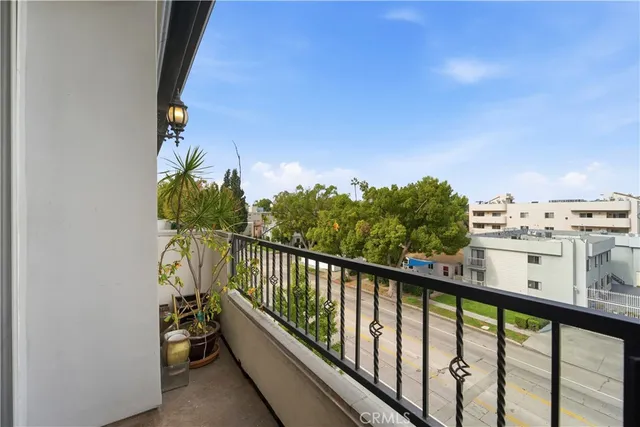 a view of balcony with furniture
