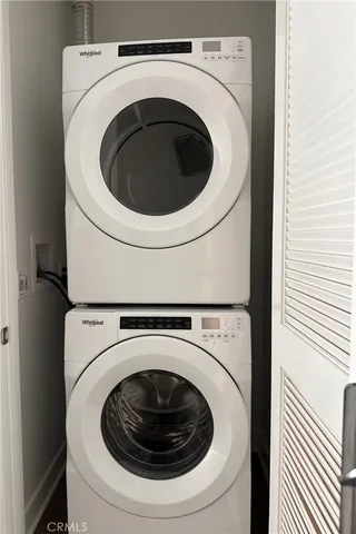 a view of a two chairs in the patio