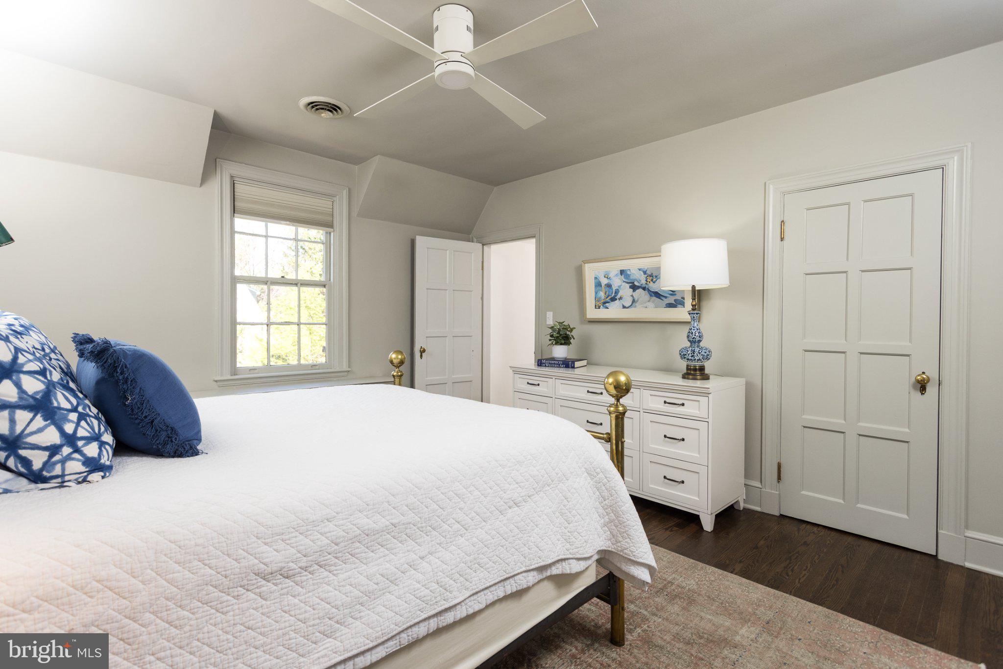 7005 Copeleigh Road Baltimore, MD 21212 - Photo 30 of 51 a bedroom with a bed and a dresser