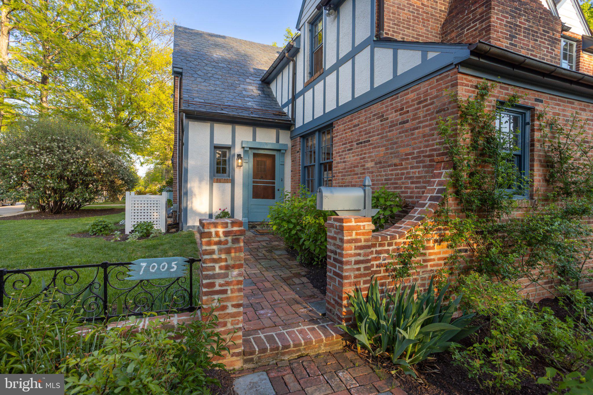 7005 Copeleigh Road Baltimore, MD 21212 - Photo 6 of 51 a front view of a house with garden
