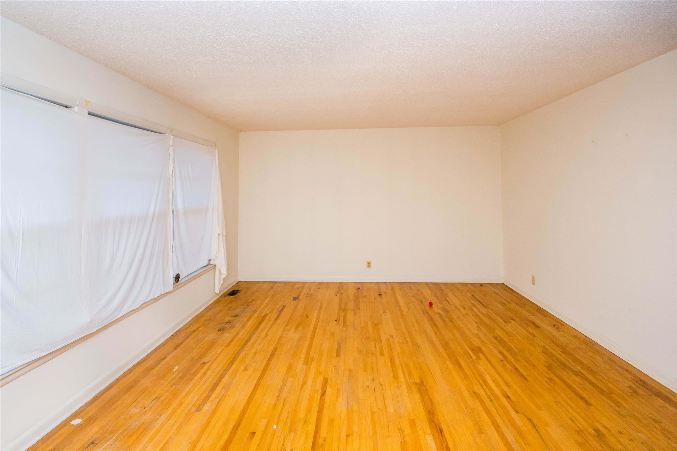 319 Notgrass Road Clarksville, TN 37042 - Photo 2 of 15 a view of a room with wooden floor