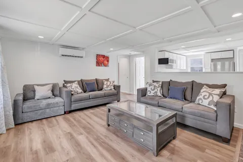 a living room with furniture and a couch