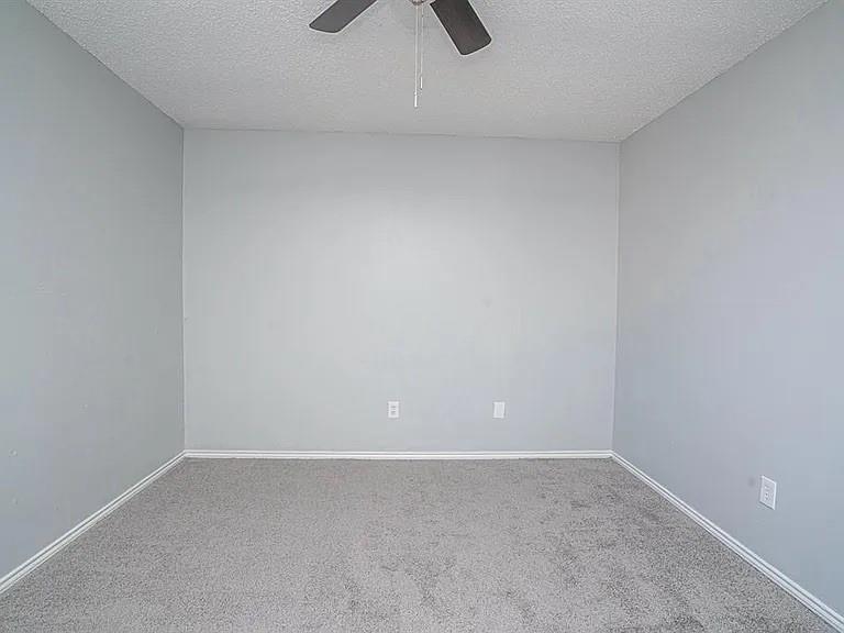 210 Rolston Road, Unit 5 Irving, TX 75060 - Photo 7 of 9 a view of an empty room