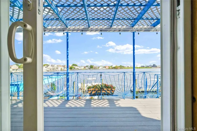 a view of a balcony with furniture