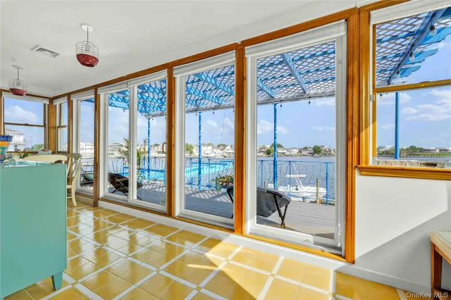 a bed room with a bed and a chair