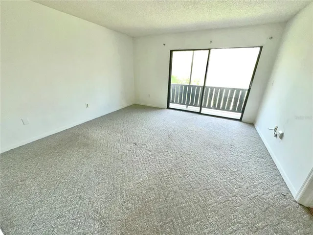 $187,000 | 5454 Saddlebrook Way, Unit 2, Wesley Chapel, FL 33543