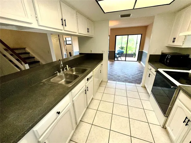 $187,000 | 5454 Saddlebrook Way, Unit 2, Wesley Chapel, FL 33543
