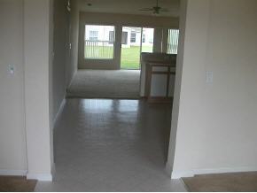 573 Southwest Lagrange Palm Bay, FL 32908 - Photo 3 of 6 a view of an empty room with a window