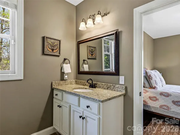 a bathroom with a shower and a bathtub
