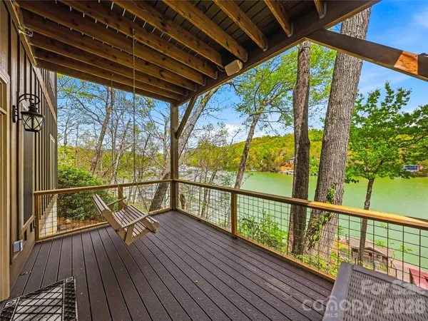 a view of balcony with furniture
