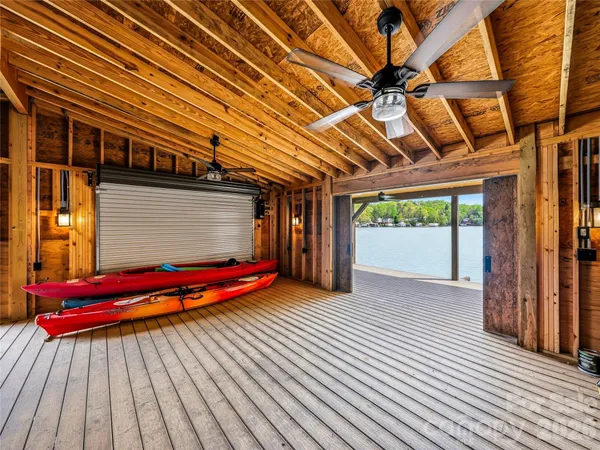 a view of entryway wooden floor and front door