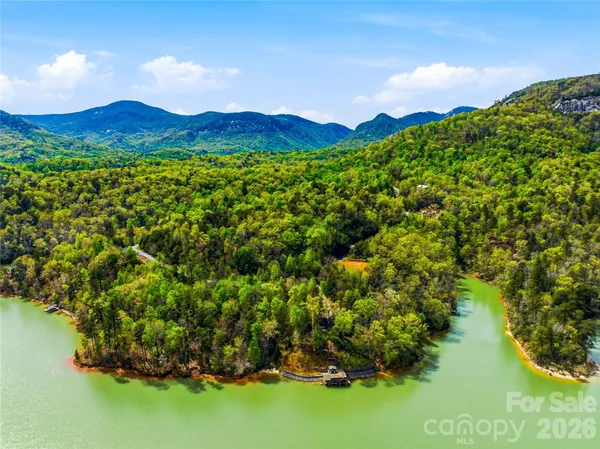 a view of front door with wooden floor