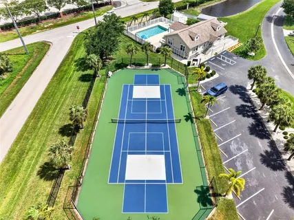 an aerial view of a house with outdoor space swimming pool and outdoor seating