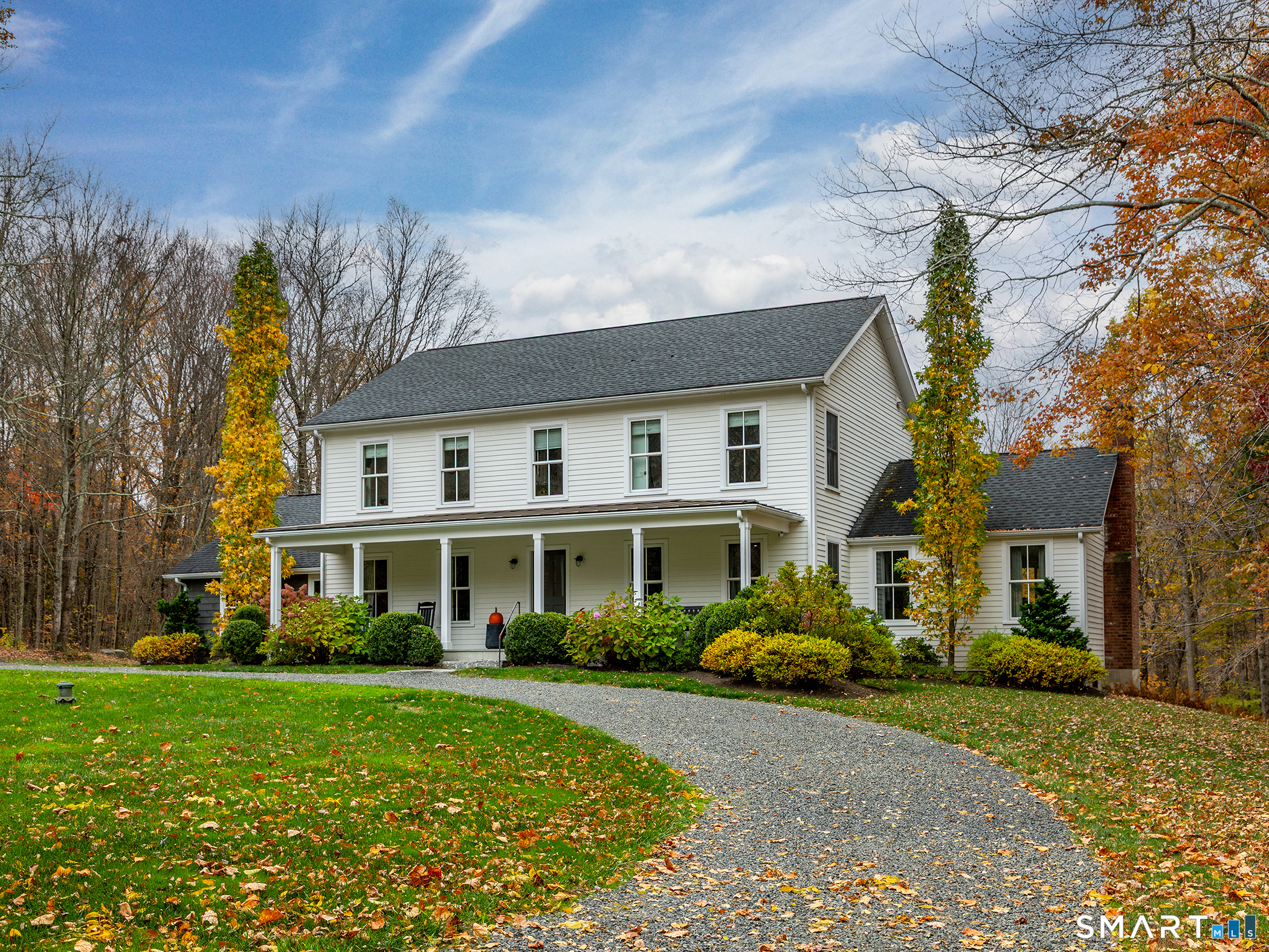 67 Sunset Lane Washington, CT 06794 - Photo 1 of 31 a front view of a house with a yard