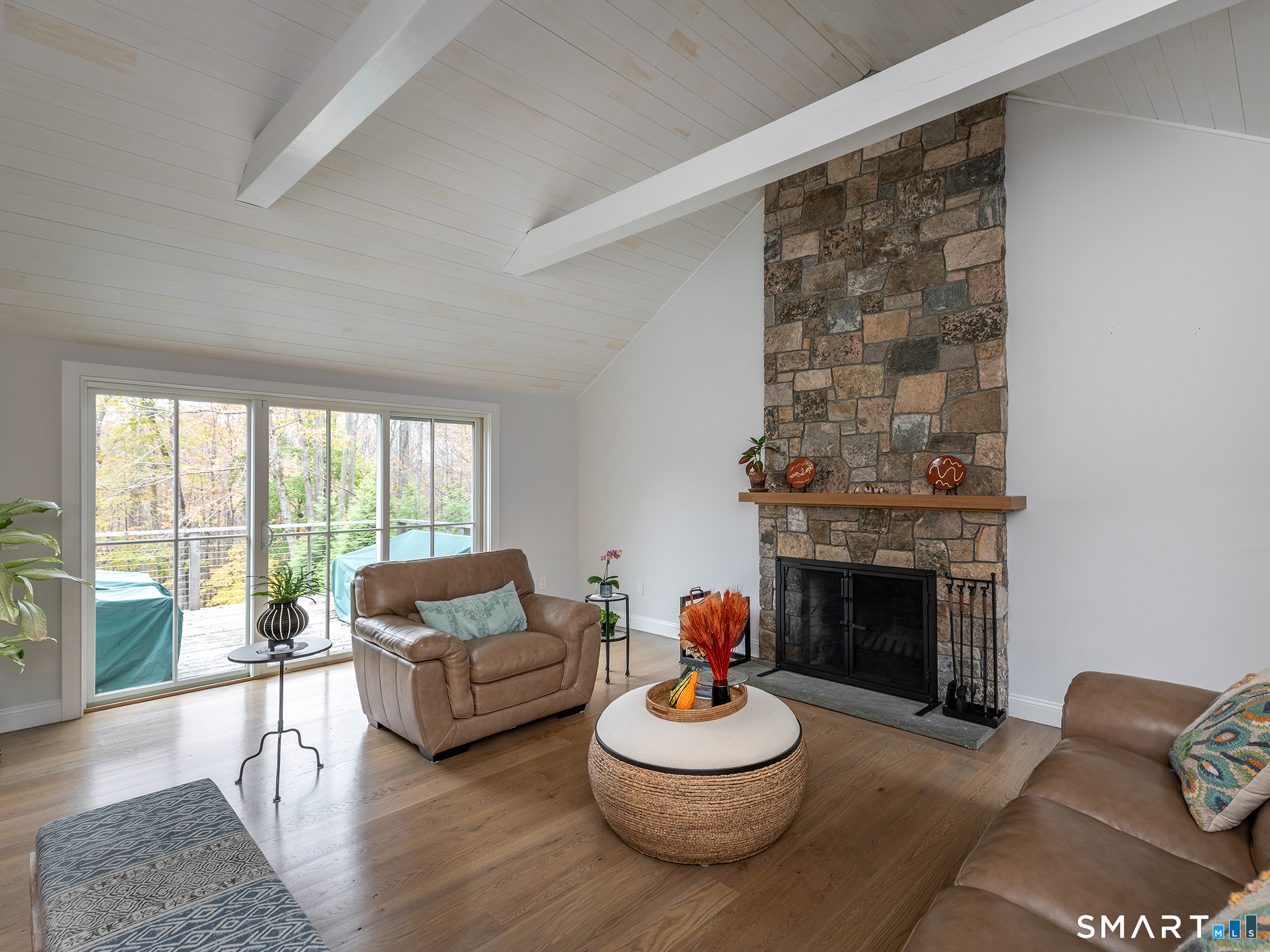 67 Sunset Lane Washington, CT 06794 - Photo 14 of 31 a living room with furniture and a fireplace