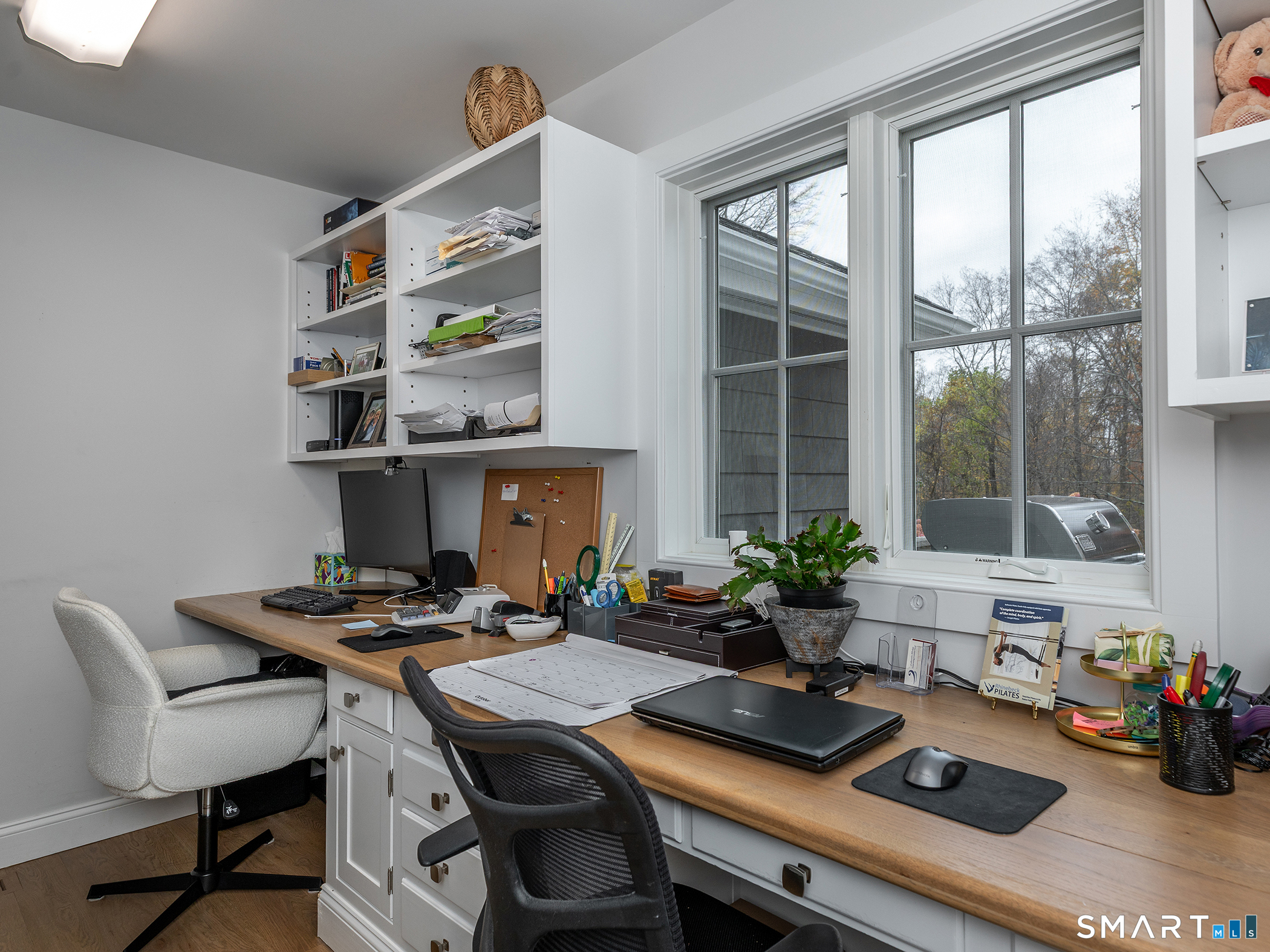 67 Sunset Lane Washington, CT 06794 - Photo 18 of 31 a table and a work space with furniture
