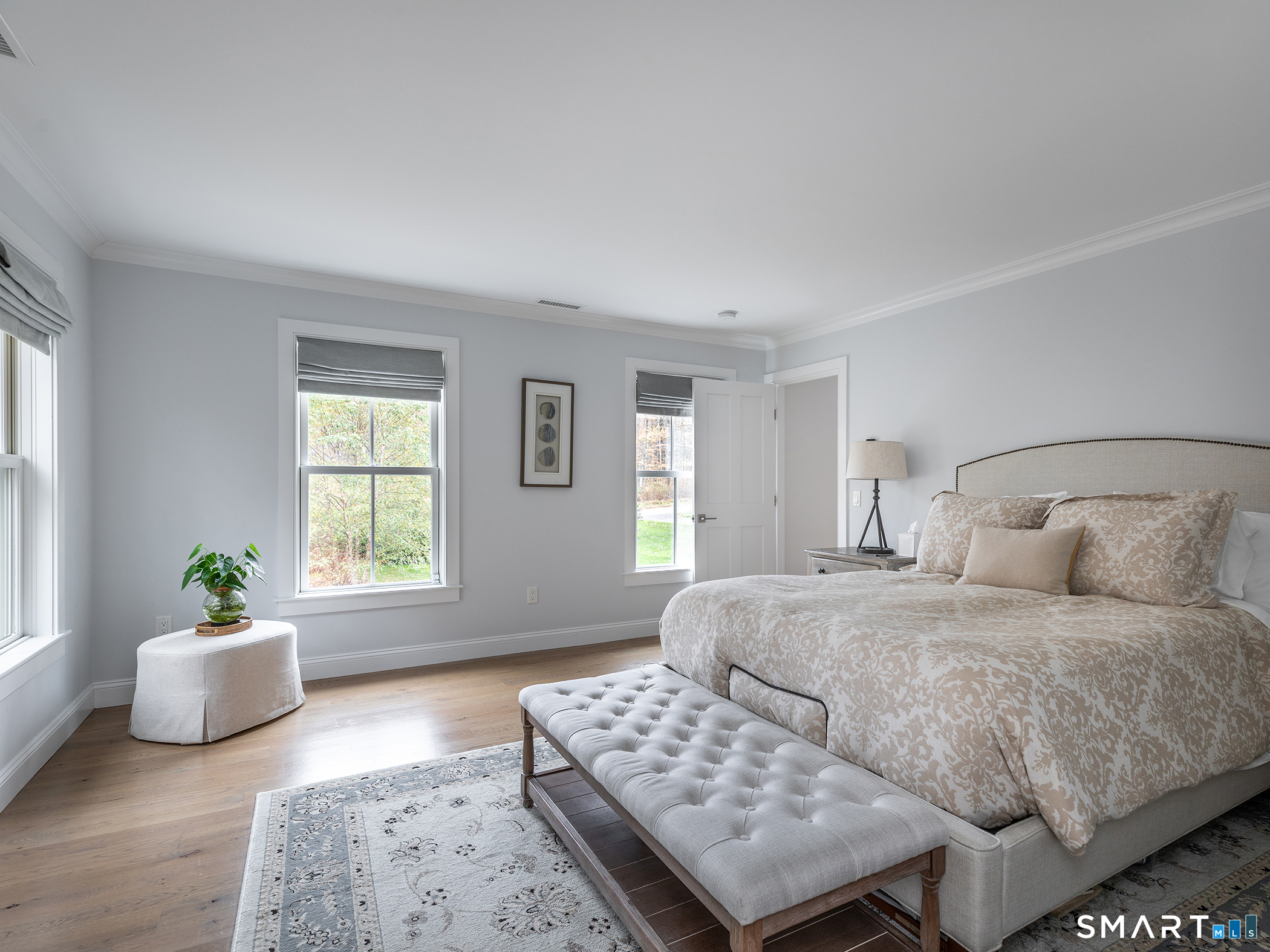 67 Sunset Lane Washington, CT 06794 - Photo 22 of 31 a bedroom with a bed and a couch