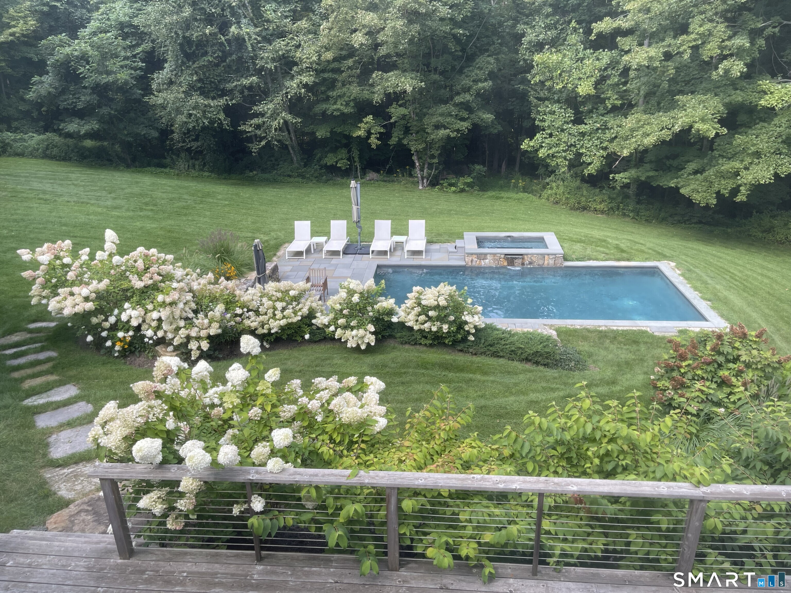 67 Sunset Lane Washington, CT 06794 - Photo 4 of 31 a view of a lake with a yard