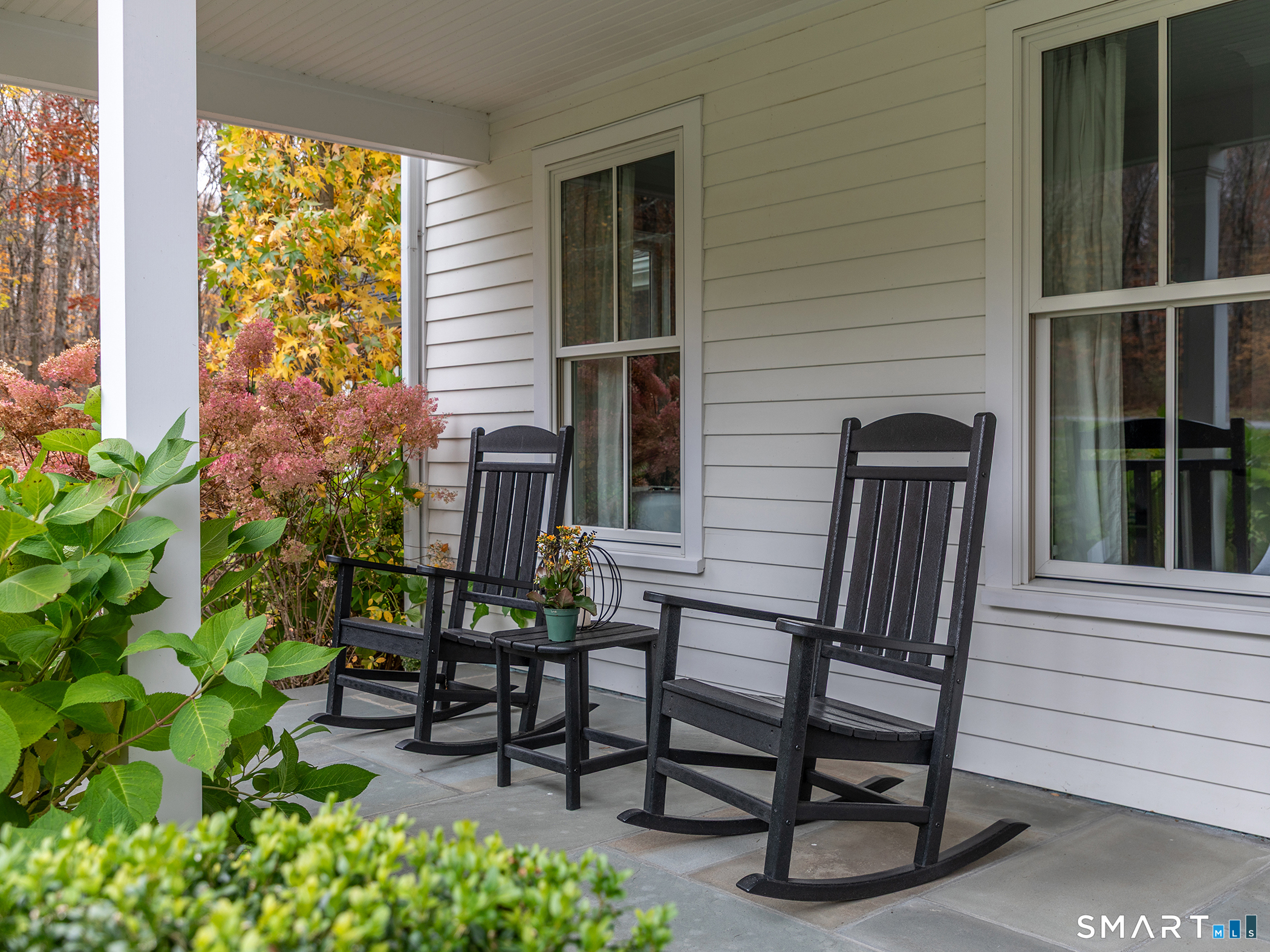 67 Sunset Lane Washington, CT 06794 - Photo 6 of 31 a view of a two chairs in the patio