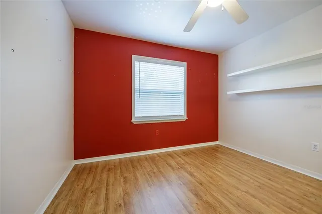 a bathroom with a granite countertop toilet sink and bathtub