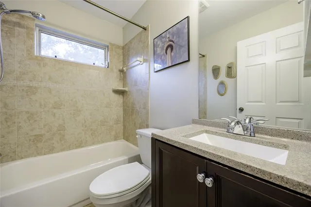 a bathroom with a bath tub and a shower