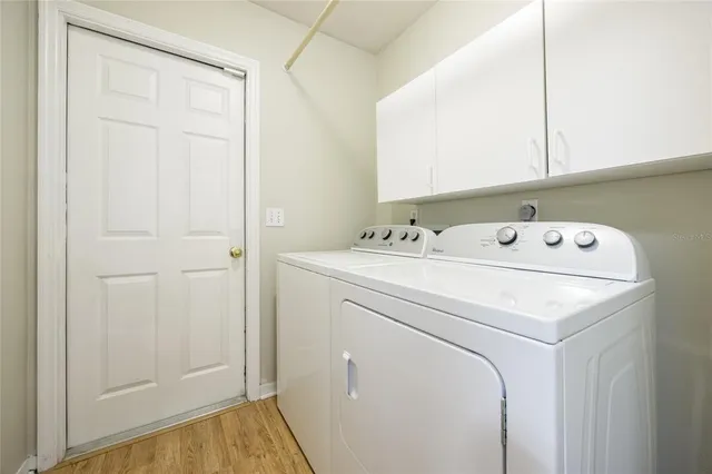 an aerial view of a house with outdoor space